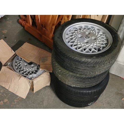 105 - Set of 4 x genuine Mini Cooper 1.3 GI alloy wheels with good tyres plus other spare alloy without