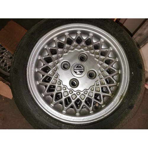 105 - Set of 4 x genuine Mini Cooper 1.3 GI alloy wheels with good tyres plus other spare alloy without