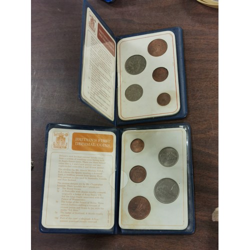 12 - 2 x Britains first decimal coin books