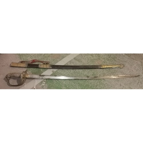 3 - Old brass lions head handle sword in hard sheath