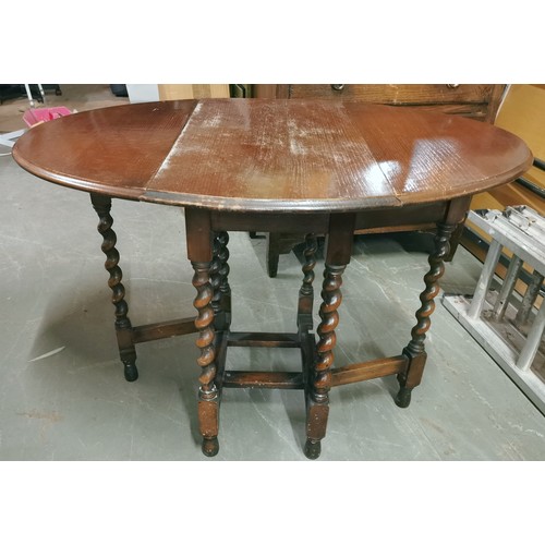 338 - 77 cm wide Barley twist gate leg oval table - top needs tlc