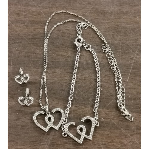 7 - Unstamped white metal with crystals, entwined heart necklace, bracelet and earrings set