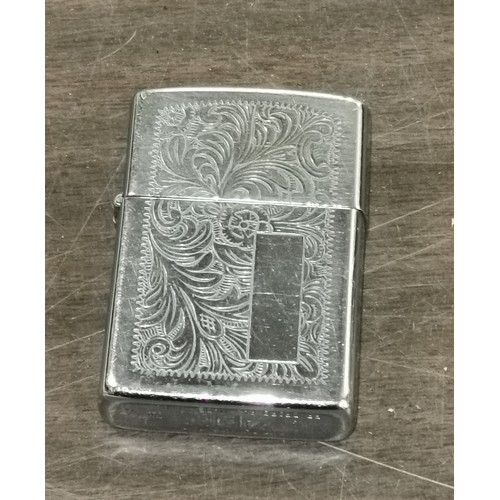 4 - Vintage Zippo lighter with patterning both sides