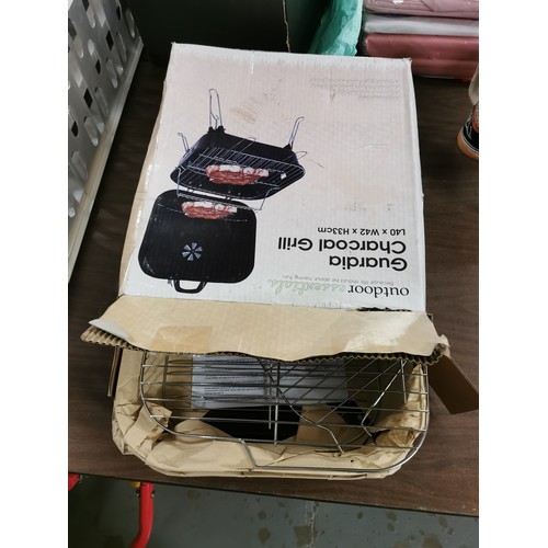 64 - Boxed and unused Guardia charcoal grill