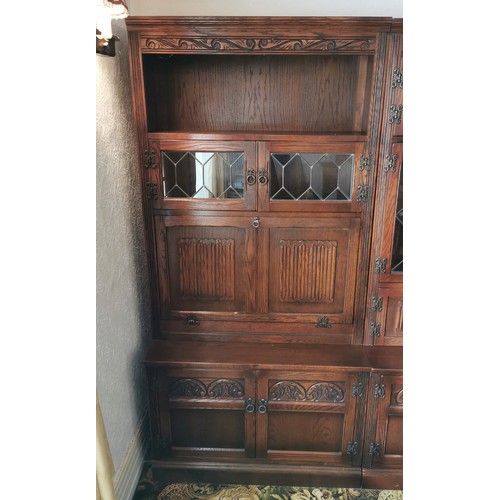 374 - Wood Bros old oak charm 3 section wall unit, total measurements 128 inches wide, 20 inches deep and ... 