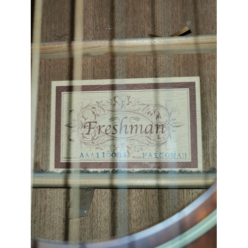 12 - Freshman 6 string acoustic guitar