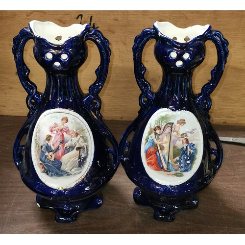 28 - Pair of 32 cm tall vintage 2 handle vase garnitures and pair of smaller Royal Vienna painted twin ha... 