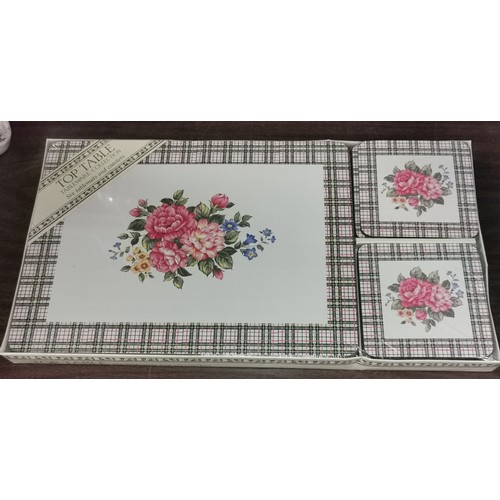 35 - Sealed set of 6 x tablemats and coasters