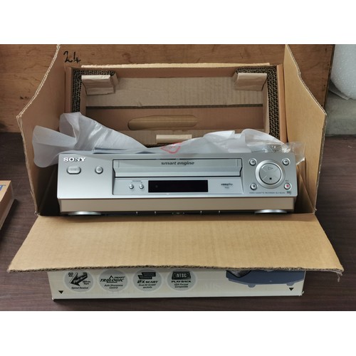 70 - Boxed silver Sony VCR model SLV-SE230 with manual and remote