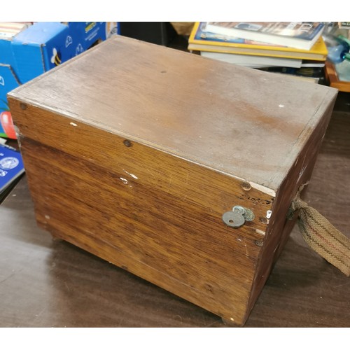 68 - Vintage lockable wooden fishing box and contents including Daiwa 7270A reel, floats etc