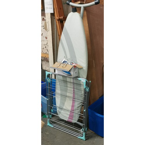 335 - Heavy duty ironing board, folding clothes airer and boxed as new Woolworths steam iron