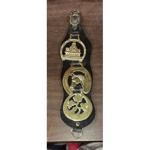 186 - 3 x horse brasses on leather belt