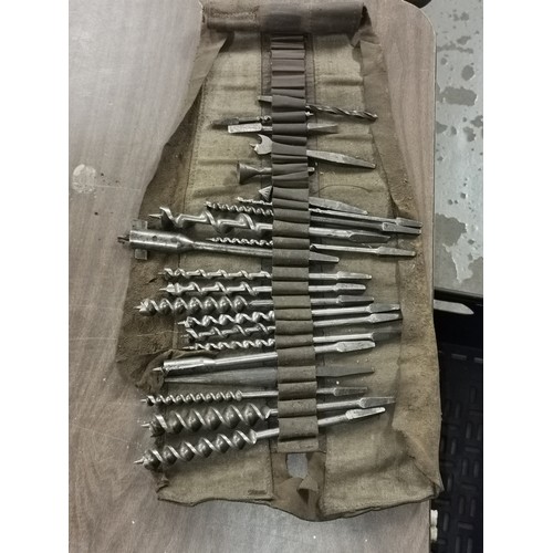 189 - Assorted large drill bits in old roll tidy