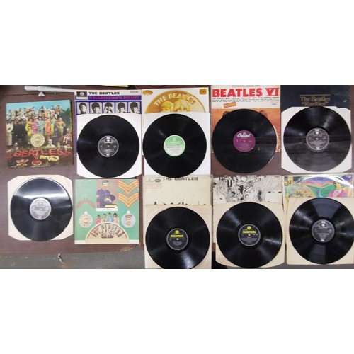 403 - 8 x The Beatles vinyl albums, mostly above average condition and Sgt Peppers with cut-outs insert