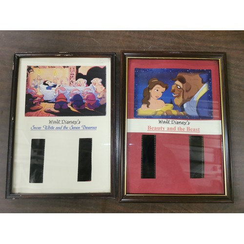 449 - Pair of 23.5 x 32.5 cm framed Disney film reel and pictures