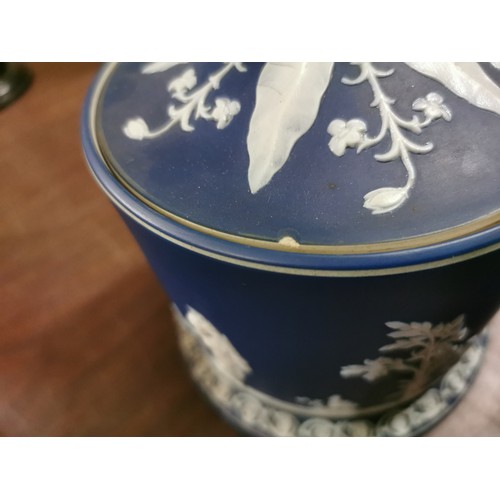 439 - Wedgwood Jasperware teapot with damage and similar biscuit caddy with small chip on lid