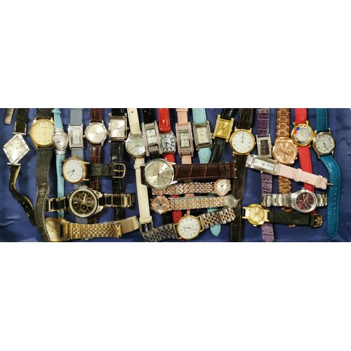 575 - Job lot of assorted gents and ladies quartz watches on wicker basket