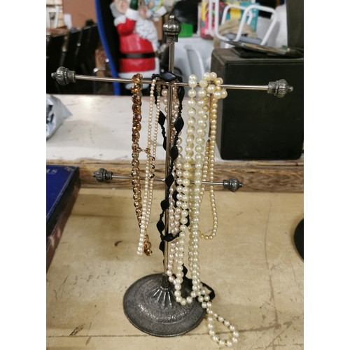 551 - Large amount of assorted dress jewellery necklaces and small metal display stand - larger stand not ... 