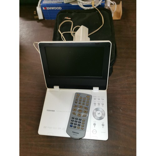 162 - Toshiba portable DVD player with remote in canvas case