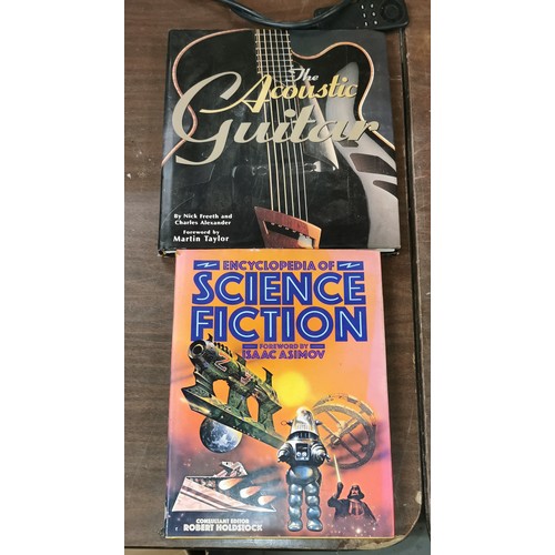 332 - The acoustic guitar and Encyclopedia of Science Fiction large hard back books