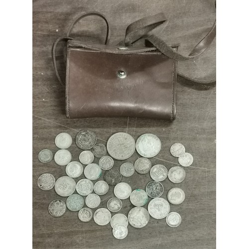 29 - Small bundle of pre Elizabeth II UK silver coins in vintage leather purse with shoulder strap