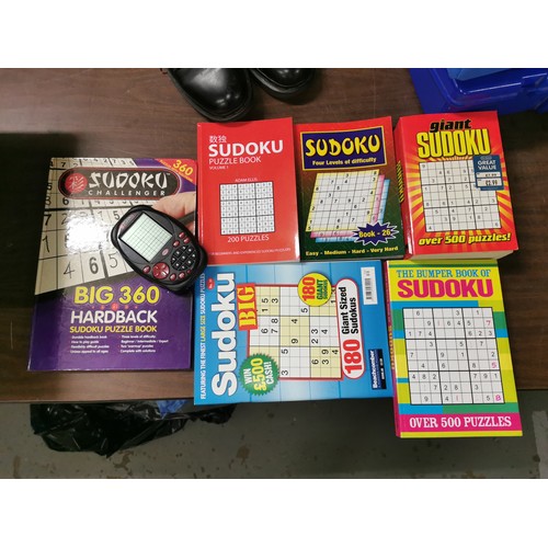 275 - Bundle of Sudoku puzzle books, either unused or first pages done only, and Sudoku electronic hand he... 