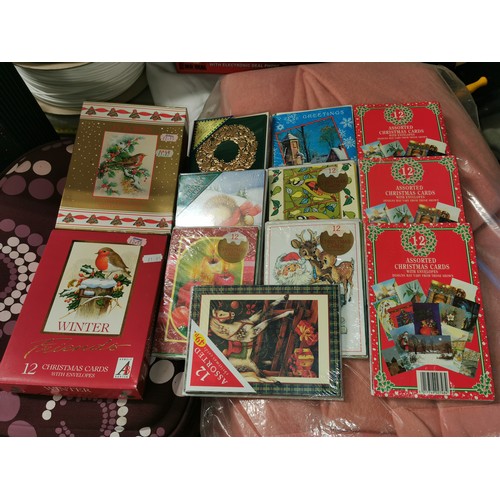 144 - Assorted packs of 12 and 15 Christmas cards, mostly unused or still sealed