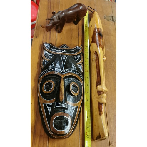 166 - 2 x carved wooden African face wall decorations and carved Rhino with repair to horn