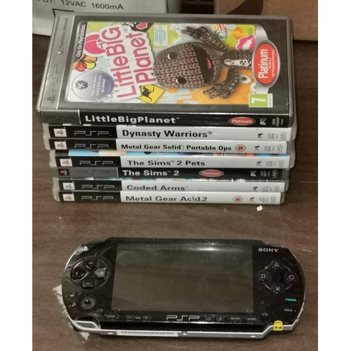 310 - Sony PSP hand held games console - no charger so untested and 7 x games