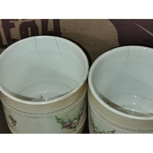 339 - Pair of Gibson and sons Windsor art ware 11 cm tall pots on 3 ball feet - both with hairline cracks