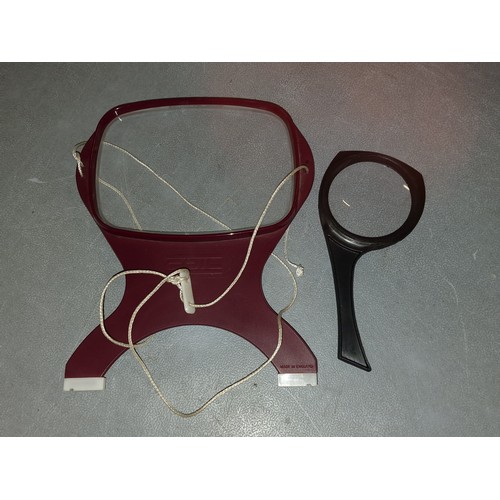 114 - Coil brand, round the neck reading magnifier & other hand held magnifying glass