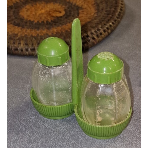 128 - Retro glass and green plastic salt and pepper on stand