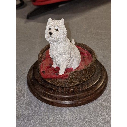 59 - 11 cm tall Country Artists West highland terrier figure in basket, mounted onto wooden base