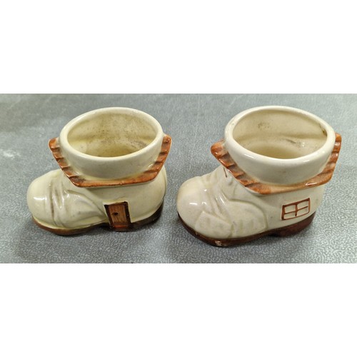 143 - Pair of 1950's old boot house egg cups