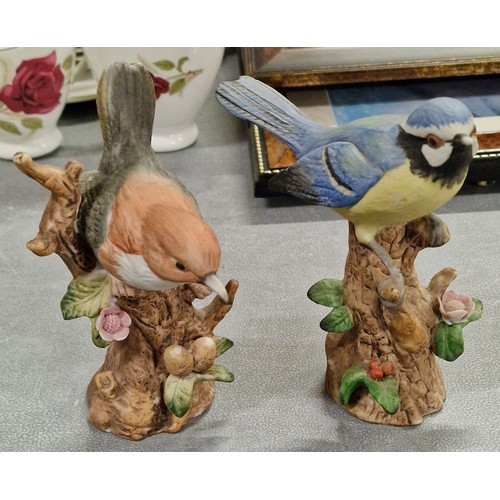 146 - Pair of porcelain bird figures