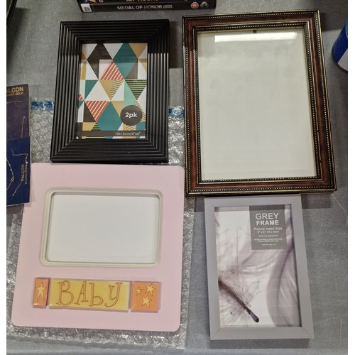 179 - 4 x assorted picture frames - kindly donated with all proceeds from this lot going to our young care... 