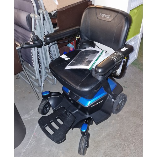 150 - Pride Go Chair electric wheelchair with charger and manual. Just over 1 year old and fully working. ... 