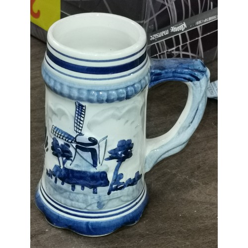 17 - 14 cm tall Delft blue and white embossed tankard