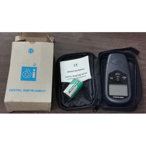 9 - New and boxed digital moisture meter with bar graph indicator, with battery and carry case