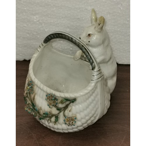 271 - Approx 9.5 cm wide and 11 cm tall porcelain rabbit posy basket