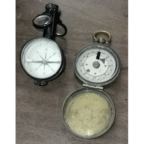 52 - 1 x vintage brass and 1 x retro plastic pocket compasses