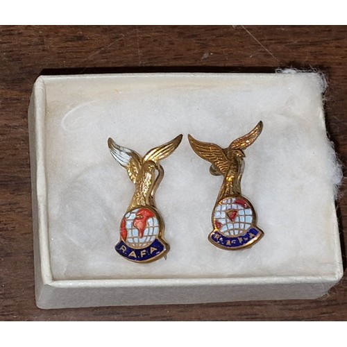 69 - Pair of approx 2 cm gilt and enamel RAFA badges