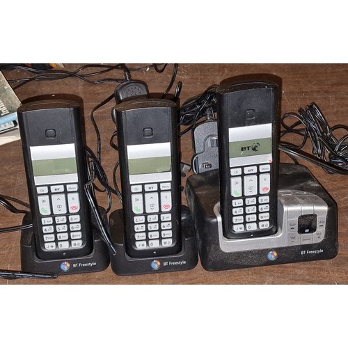 122 - BT Freestyle triple home phone set with answer machine - working but not holding charge for long so ... 