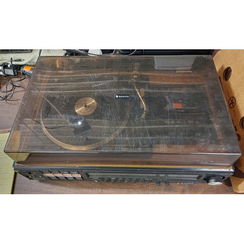 173 - Vintage Sanyo stereo music centre model JXT 4406 - tape and radio work but turntable stiff and will ... 