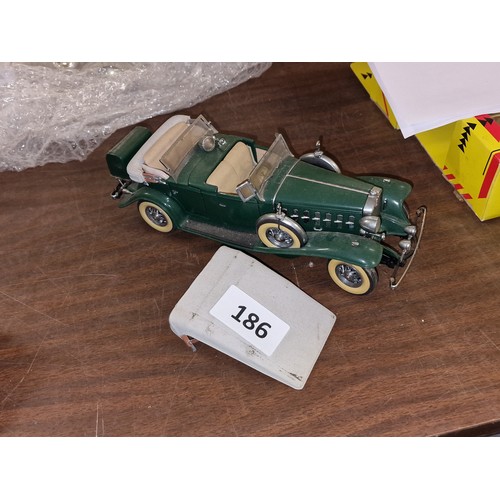 186 - Unboxed Danbury Mint large diecast model of a 1932 Cadillac V-18	- soft top loose and front left hea... 