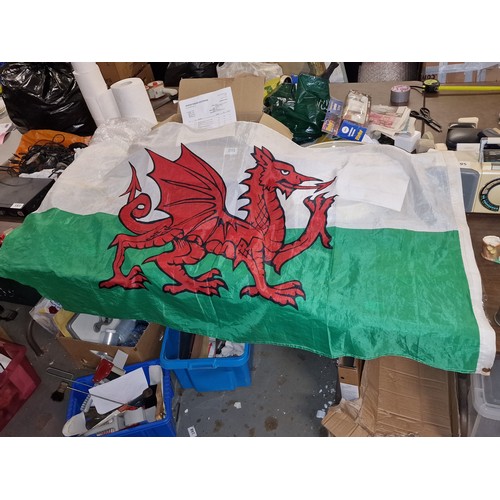 205 - Approx 5 x 3 ft nylon Welsh dragon flag - corners missing on one end