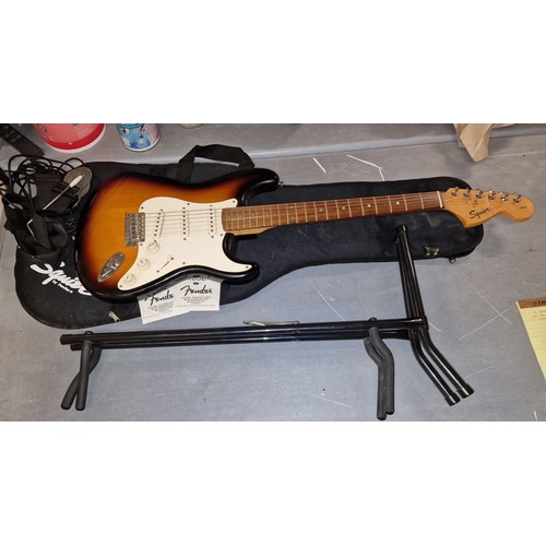 210 - Squier Strat by Fender (affinity series) electric guitar in matching case and with stand