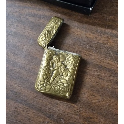 50 - Gilt vesta case with embossed picture front and back