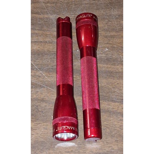 159 - 2 x red mini Maglite torches