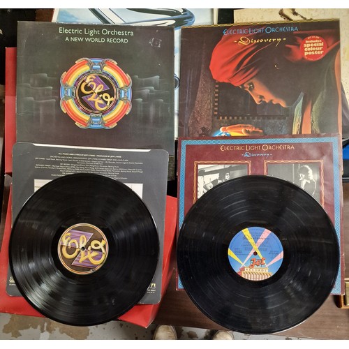 62 - 2 x ELO vinyl albums in good condition being A new world record & Discovery (with poster)